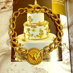 Gold tone medallion choker